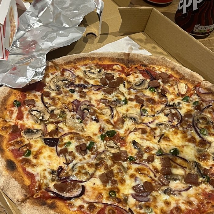 Mushroom, onion and pepperoni pizza